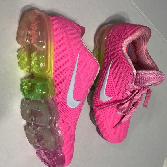 pink nikes with rainbow bottom